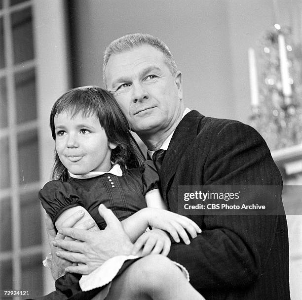 American actor Eddie Albert poses with his daughter, Maria , in their 72nd Street home on an episode of the CBS celebrity interview program 'Person...