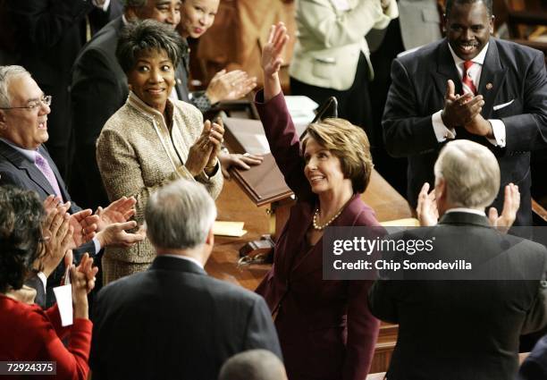 Speaker of the House Nancy Pelosi waves to colleagues while being nominated as the next Speaker of the House during a swearing in ceremony for the...