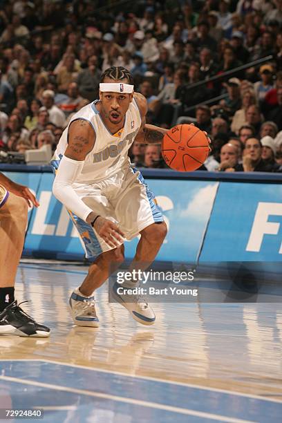 Allen Iverson of the Denver Nuggets drives against the Sacramento Kings at the Pepsi Center on December 22, 2006 in Denver, Colorado. The Kings won...