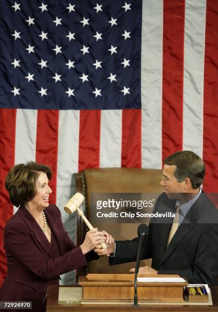 Speaker of the House Nancy Pelosi takes the Speaker's gavel from House Minority Leader Rep. John Boehner after being elected as the first woman...