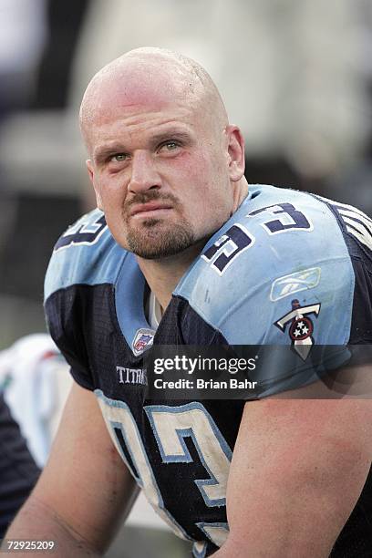 Kyle Vanden Bosch of the Tennessee Titans looks on from the bench during the game against the Jacksonville Jaguars on December 17, 2006 at LP Field...