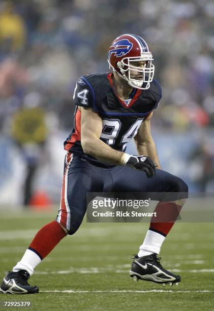 Aaron Schobel of the Buffalo Bills moves on the field during the game against the Miami Dolphins on December 17, 2006 at Ralph Wilson Stadium in...