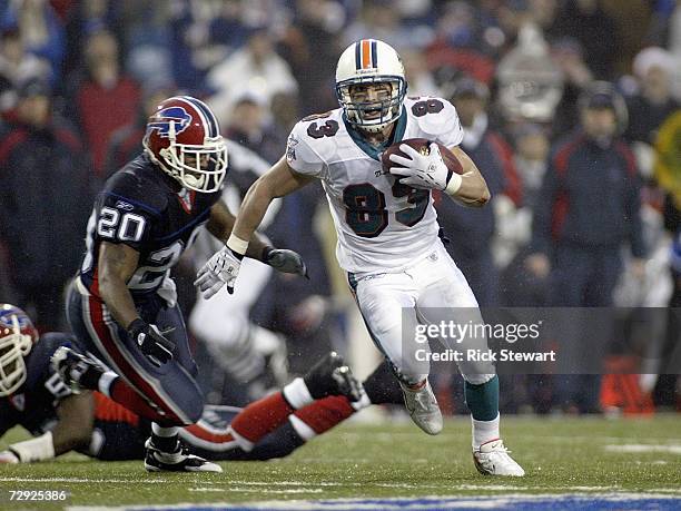 Wes Welker of the Miami Dolphins carries the ball during the game against the Buffalo Bills on December 17, 2006 at Ralph Wilson Stadium in Orchard...