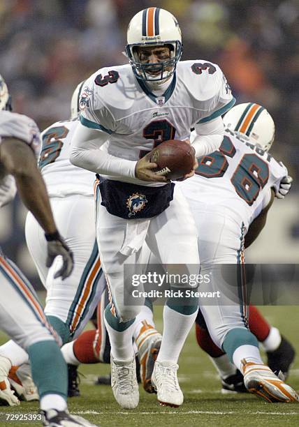 Joey Harrington of the Miami Dolphins looks to hand off the ball during the game against the Buffalo Bills on December 17, 2006 at Ralph Wilson...