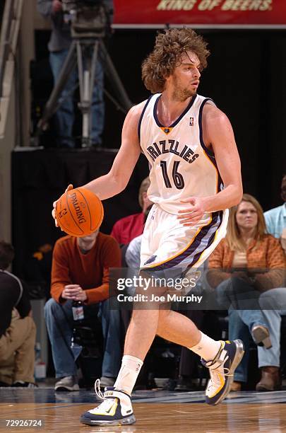 Pau Gasol of the Memphis Grizzlies moves the ball against the Milwaukee Bucks on December 27, 2006 at FedExForum in Memphis, Tennessee. The Bucks won...