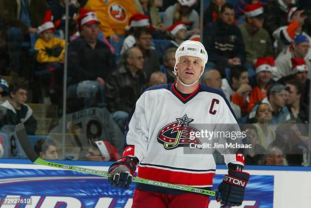 Adam Foote of the Columbus Blue Jackets looks on against the New York Islanders at Nassau Coliseum on December 23, 2006 in Uniondale, New York. The...