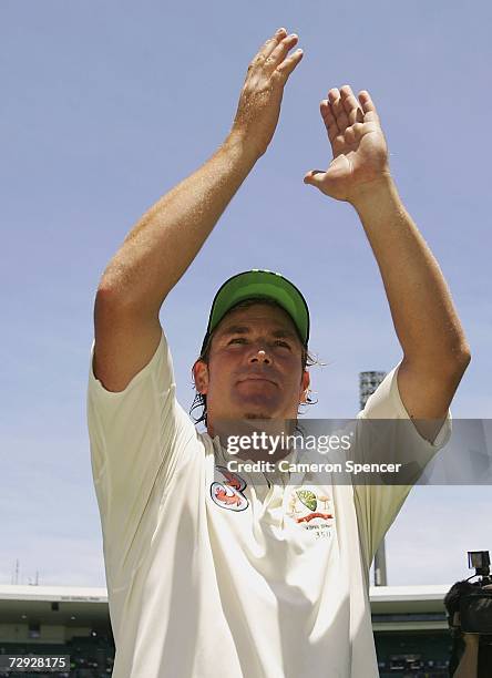 Shane Warne of Australia thanks the crowd after winning the final test and wrapping up the series 5-0 after winning day four of the fifth Ashes Test...