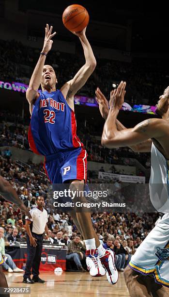 Tayshaun Prince of the Detroit Pistons gets a shot off over Tyson Chandler of the New Orleans/Oklahoma City Hornets on January 4, 2007 at the Ford...