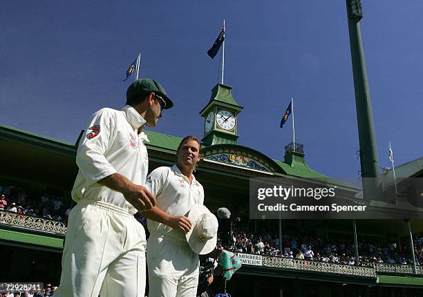 Justin Langer and Shane Warne of Australia walk on to field at the SCG in their last test match during day four of the fifth Ashes Test Match between...