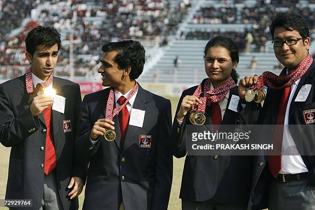 India's Oil and Natural Gas Corporation employees and gold medal winners at the Doha Asian Games Pankaj Advani , Krishnan Sasikiran , Koneru Humpy...