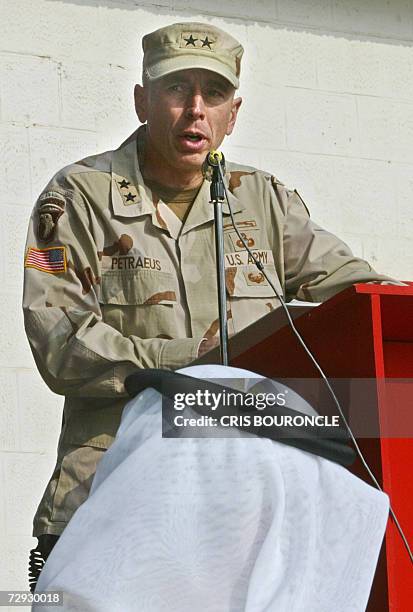 -- In this 06 January 2004 file photo, US Lieutenant General David Petraeus participates in a ceremony in Mosul, Iraq, commemorating the 83rd...