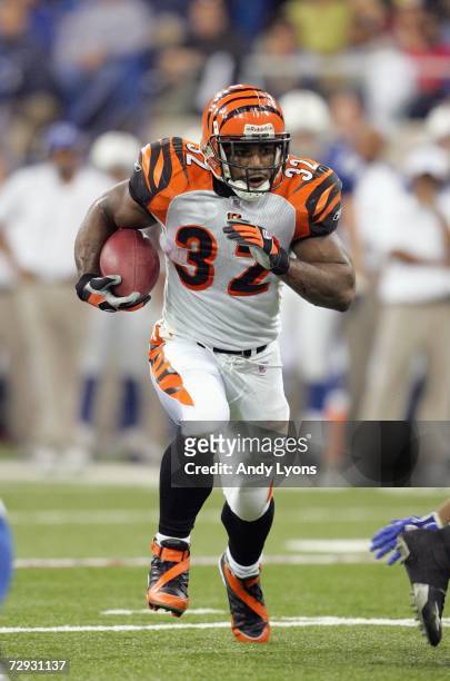 Rudi Johnson of the Cincinnati Bengals carries the ball during the game against the Indianapolis Colts at the RCA Dome on December 18, 2006 in...