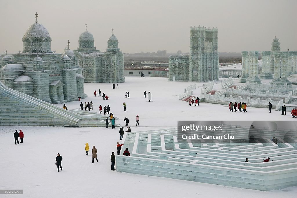 Harbin Tourists view ice buildings on display in the Grand Ice and Snow ...