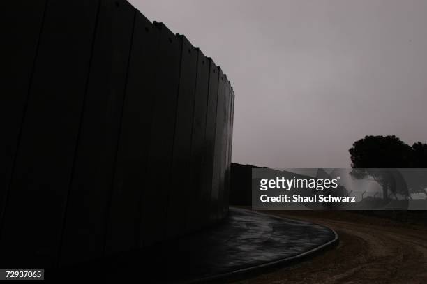 View of the concrete separation wall between the Palestinian city of Abu Dis and Israel, November 22, 2004. With Gaza already being separated by a...