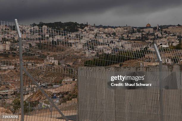 View of the concrete separation wall between the Palestinian city of Abu Dis and Israel, November 22, 2004. With Gaza already being separated by a...