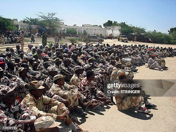 Former soldiers in Somalia?s army sit inside what was the compound of Somalia's late dictator Mohammed Siad Bare's revolutionary party in Mogadishu,...