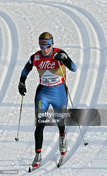 Finland's Virpi Kuitunen competes during the 15 km classic mass start of the cross-country World Cup in Val di Fiemme, 06 Jannuary 2007. Kiutunen won...