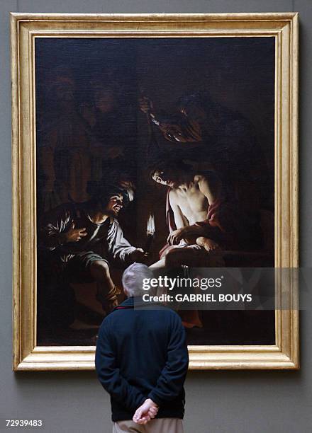 Los Angeles, UNITED STATES: A man looks at "Christ Crowned with Thorns" by Dutch Gerrit van Honthorst at the Getty Center in Los Angeles, 05 January...