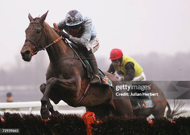 Ruby Walsh and Silverburn clear the last flight to land The Anglo Irish Bank Tolworth Hurdle Race run at Sandown Park Racecourse on January 6, 2007...