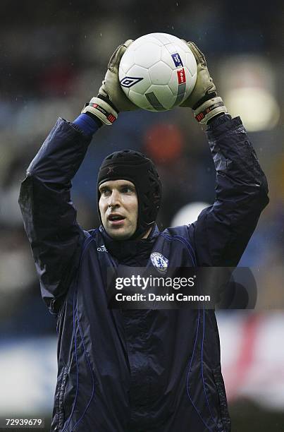 Petr Cech of Chelsea wears protective headgear as he warms up prior to the FA Cup sponsored by E.ON 3rd Round match between Chelsea and Macclesfield...