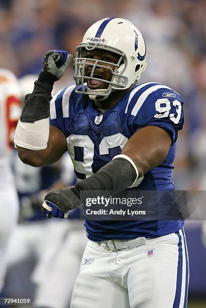 Dwight Freeney of the Indianapolis Colts celebrates after he sacked Trent Green of the Kansas City Chiefs during their AFC Wild Card Playoff Game...