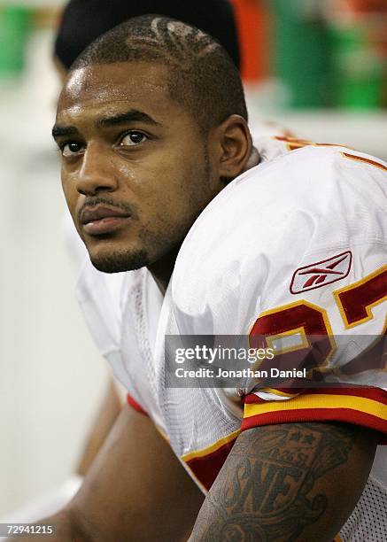 Larry Johnson of the Kansas City Chiefs looks on from the bench against the Indianapolis Colts during their AFC Wild Card Playoff Game January 6,...