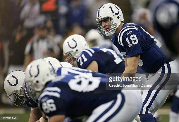 Peyton Manning of the Indianapolis Colts calls out signals at the line of scrimmage against the Kansas City Chiefs during their AFC Wild Card Playoff...