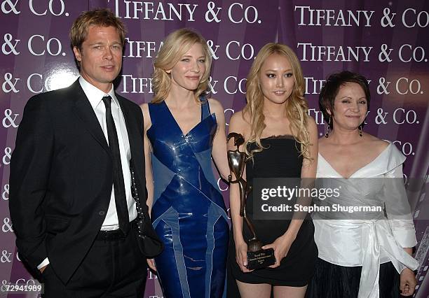 Actors Brad Pitt, Cate Blanchett, Rinko Kikuchi and Adriana Barraza of the film "Babel" poses in the press room with the Ensemble Performance Award...