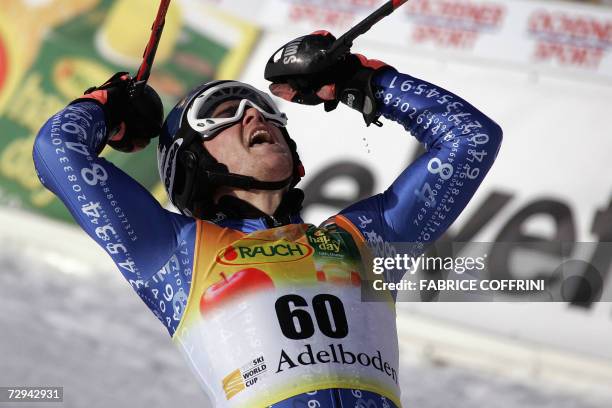 Adelboden, SWITZERLAND: Marc Berthod of Switzerland reacts in the finish area, 07 January 2007 after winning with his bib number 60 in the Alpine...