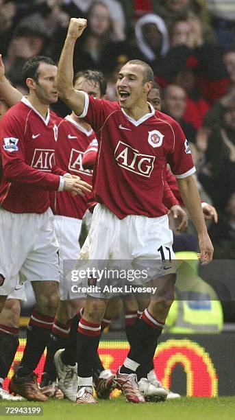 Henrik Larsson of Manchester United celebrates after scoring the opening goal on his debut during the FA Cup sponsored by E.ON Third Round match...