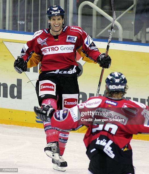 Charlie Stephens of Duesseldorf celebrates after scoring during the DEL Bundesliga match between DEG Metro Stars and Augsburger Panther at the ISS...