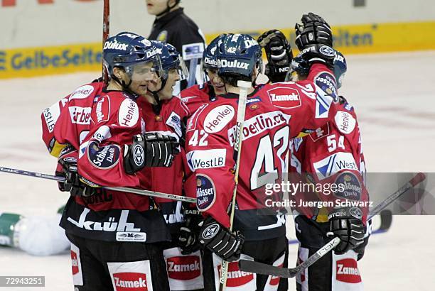Dusseldorf players celebrate during the DEL Bundesliga match between DEG Metro Stars and Augsburger Panther at the ISS Dome on January 07, 2007 in...