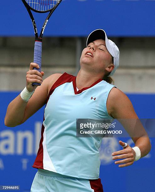 Vera Zvonareva of Russia reacts after losing a point during her match against Australia's Samantha Stosur at the Sydney International tennis...