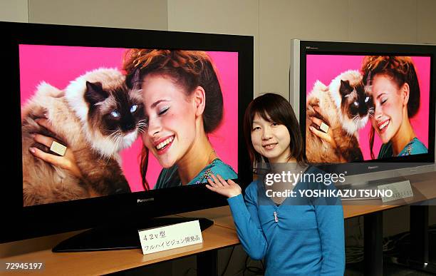 Misa Nakayama of Japan's electronics giant Matsushita, unveils the prototype model of a 42-inch sized high-definition plasma display panel , which...