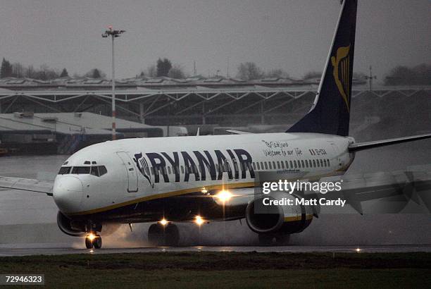 Ryanair flight from Dublin touches down at Bristol International Airport on January 8, 2006 Lusgate, England, the first of two flights that landed...