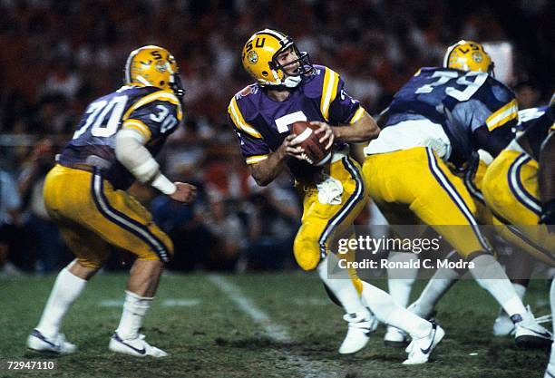 Quarterback Alan Risher of the Louisiana State University Tigers drops back to pass during the Orange Bowl game against the University of Nebraska...