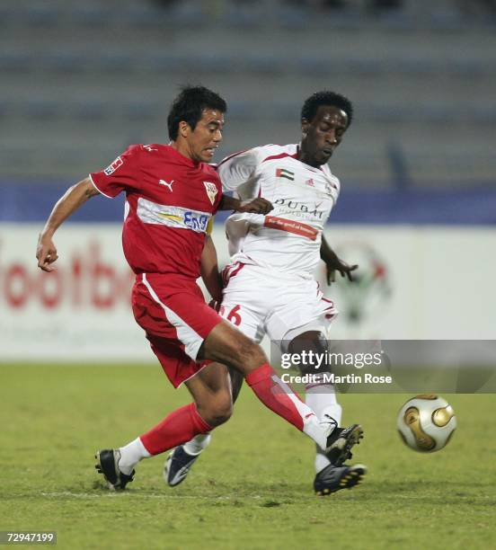 Salem Khamis of United Arab Emirates and Pavel Pardo of Stuttgart fight for the ball during the Dubai Challenge Cup match between Vfb Stuttgart and...