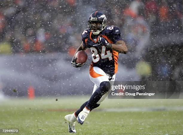 Javon Walker of the Denver Broncos carries the ball during the game against the Cincinnati Bengals as the Broncos defeated the Bengals 24-23 on...