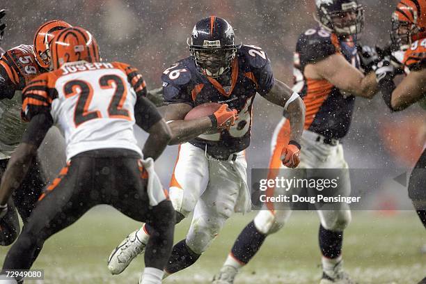 Tatum Bell of the Denver Broncos carries the ball up the middle during the game against the Cincinnati Bengals, as the Broncos defeated the Bengals...