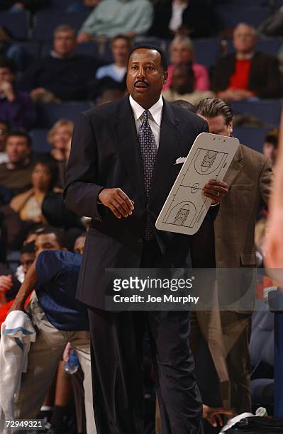 Head coach Mike Woodson of the Atlanta Hawks walks the sidelines during a game against the Memphis Grizzlies at FedExForum on December 15, 2006 in...