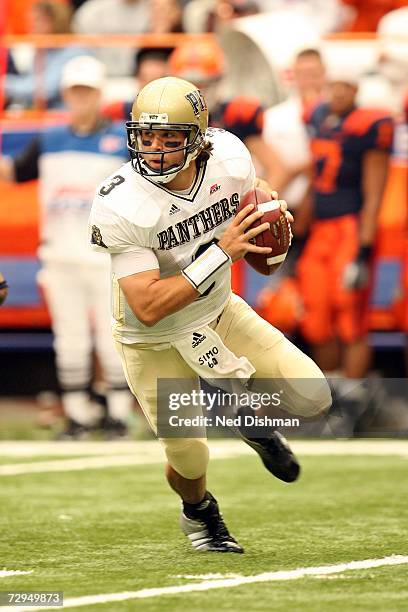 Quarterback Tyler Palko of the University of Pittsburgh Panthers looks to make a pass against the Syracuse University Orange at the Carrier Dome on...