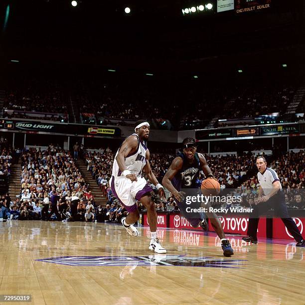 Ricky Davis of the Minnesota Timberwolves drives to the basket against John Salmons of the Sacramento Kings on November 6, 2006 at ARCO Arena in...