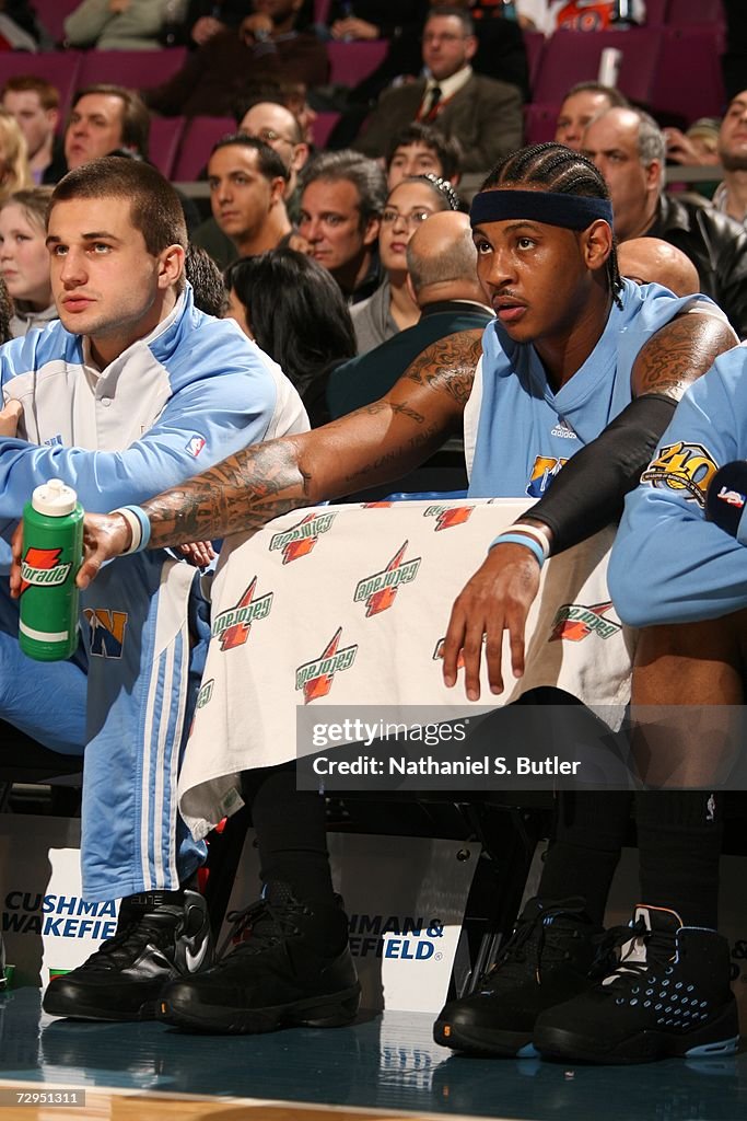Carmelo Anthony of the Denver Nuggets sits on the bench against the  Portland Trail Blazers on January 31 2006 at th…