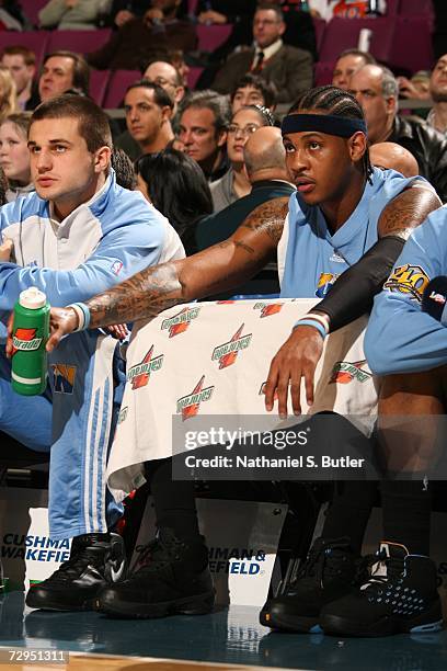 Carmelo Anthony of the Denver Nuggets sits on the bench during the NBA game against the New York Knicks on December 16, 2006 at Madison Square Garden...