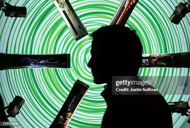 Attendee walks by a displaly of Microsoft XBox 360 gaming consoles at the Las Vegas Convention Center during the 2007 International Consumer...