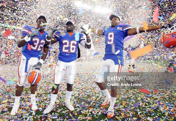 Kenneth Tookes of the Florida Gators and Jermaine McCollum and Dustin Doe celebrate after defeating the Ohio State Buckeyes after the 2007 Tostitos...