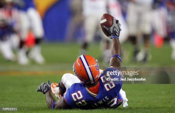 Cornerback Reggie Lewis of the Florida Gators shows the ball after an interception in the second quarter against the Ohio State Buckeyes during the...