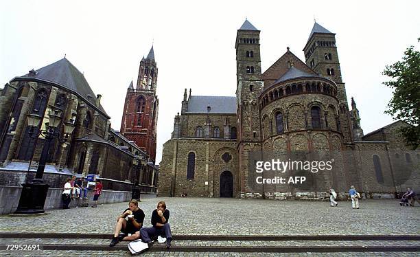 Maastricht, NETHERLANDS: A recent, undated picture shows Vrijthof square in Maastricht with Saint Jans church and Saint Servaas Basilica in...