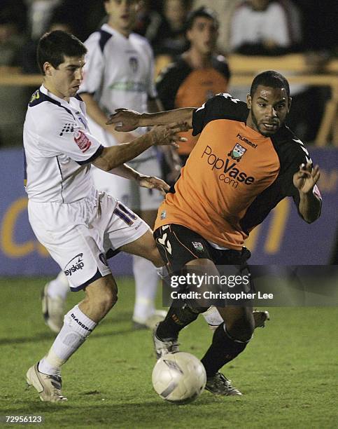 Jason Puncheon of Barnet battles with Kem Izzet of Colchester during the FA Cup sponsored by E.ON 3rd Round match between Barnet and Colchester...