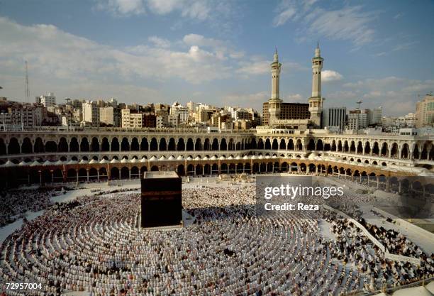 Muslims pray around the Kaaba, Islam's most sacred sanctuary and pilgrimage shrine, on Eid ul-Fitr day, which commemorates the end of Ramadan within...